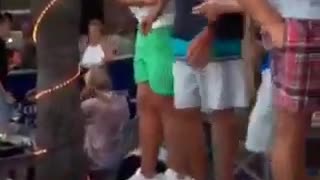 Guys dancing on table parents watch