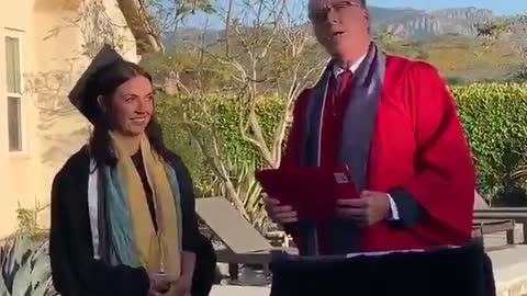 Aunt & Uncle throw backyard graduation ceremony for their niece and her boyfriend