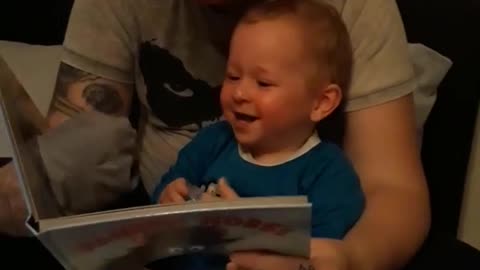 Baby Boy Can't Stop Giggling During Bedtime Story