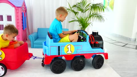 Kids play with toy train