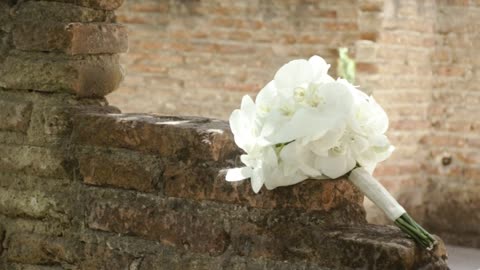 Bridal bouquet in an abandoned construction