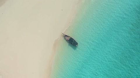 Aerial Shot of a Boat in the Shore