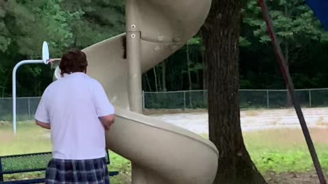 Chocolate Lab Has Ecstatic Time at Playground