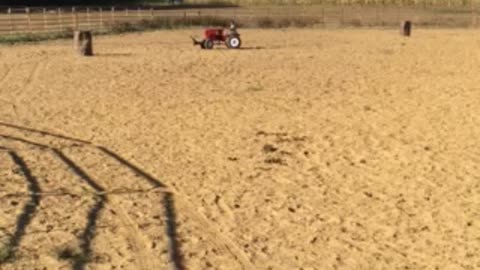 Lovin his little tractor