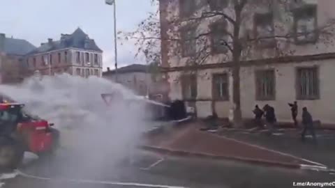 French Patriot Farmers Return Police Water-Cannon Fire With a Barrage of Shit