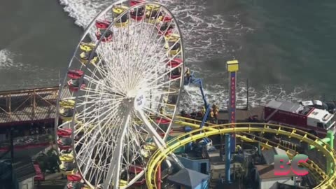 Santa Monica Pier evacuated as man ‘with bomb’ clings to Ferris wheel in terrifying scenes