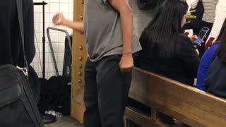 Guy black hat grey shirt dancing subway 14 street