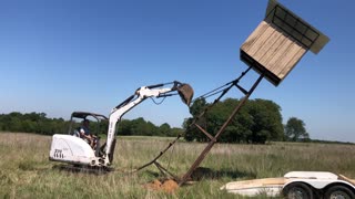 How to erect a 30 foot deer stand with an excavator