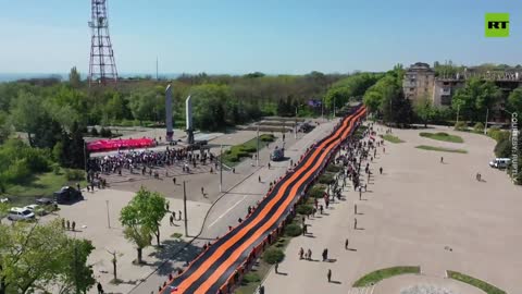 RT. Eternal Flame and giant Saint George Ribbon in Mariupol