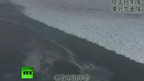 Japan Earthquake Helicopter aerial view video of giant tsunami waves