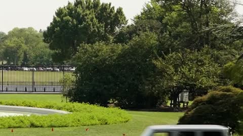 President Biden Drives an Electric Jeep on the White House South Lawn