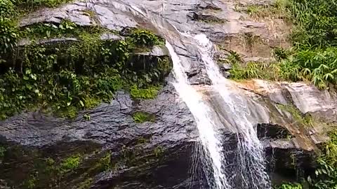 THIS WATERFALL IN THE FOREST IS THE MOST BEAUTIFUL THING WE CAN ADIMIRATE