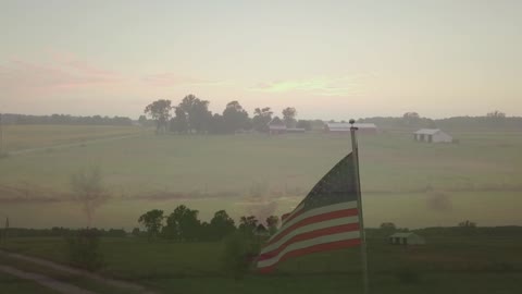 Drone Video of American Flag at Sunset