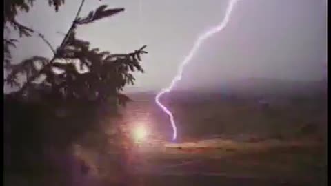 Lightning hit the big tree next to the house, it was really thrilling