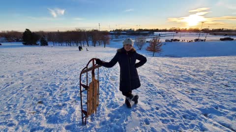 Winter sledding down hill