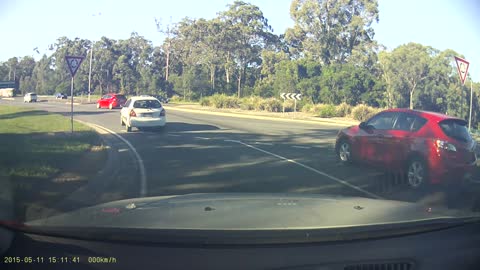 Dash Cam Captures Incredible Near Miss Roundabout Accident