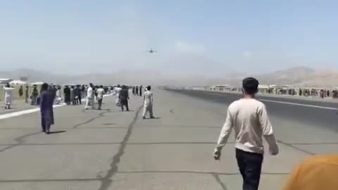 Afghan falls to his/her Death from US cargo plane
