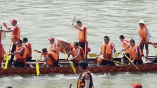 Live Dragon Boat Festival in Han River at Ankang City China