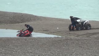 Guy Crashes ATV into Lake