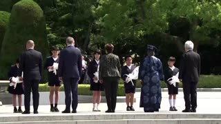 G7 guest leaders lay flowers at Hiroshima Peace Park