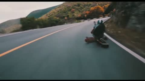 AWESOME LONGBOARD DOWNHILL WITH JUMP AND PEOPLE