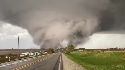 A huge tornado is currently on the ground in Harlan, Iowa