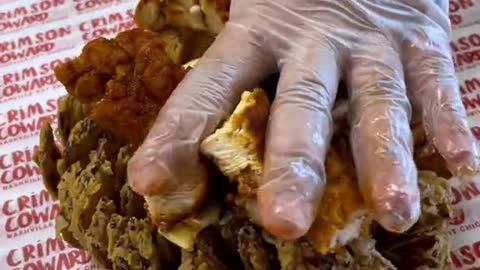 How much would you pay for this blooming onion loaded w Mac and hot chicken from