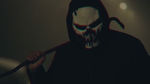 a maskman hold crowbar in hand