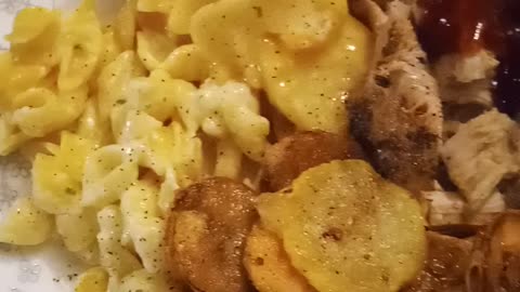 Pulled pork with taters au gratin fried squash and garlic shell pasta