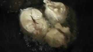 cooking fried chicken
