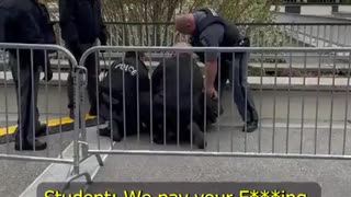 Crazy leftist pro-abortion professor resists arrest after attempting to destroy a pro-life display..