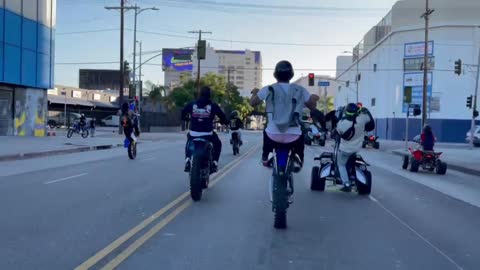 Wild riding Downtown Los Angeles Motorcycle Enthusiests Dancing witih Motorcycles
