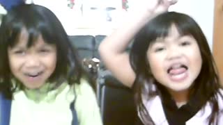 MY DAUGHTERS MAKING FACES AND HAVING FUN in 2009