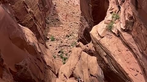 Swinging at the moab rope swing by Heavy