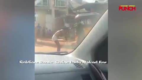 soldiers stripe and beat a lady in Nigeria