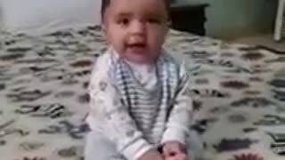 Baby is dancing with music