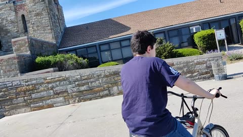 Spencer riding his tricycle at Jones beach air show VID_20230521_132721 VID_20230527_154055