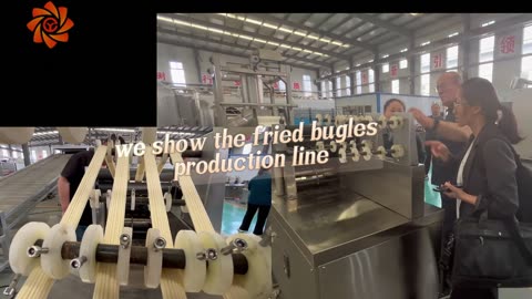 Customers visited our factory and we showed them the production line of fried bugles.