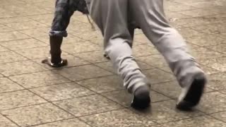 Man dances to music in subway, gets on all fours and starting running