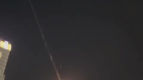 Air sirens in Tel Aviv and what appears to be a missile flying in the air