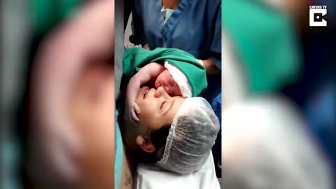 Emotional Moment Newborn Clings To Mother's Face