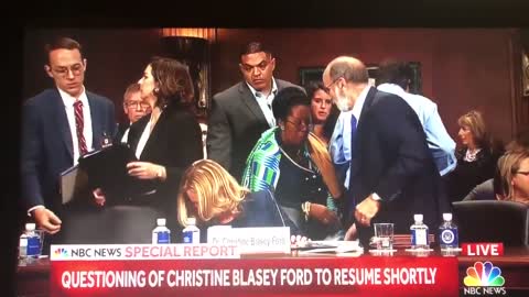 Sheila Jackson Lee appears t pass envelope to Ford's attorney