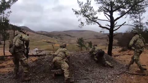 U.S. Army conduct a platoon live fire exercise as part of Exercise Rock