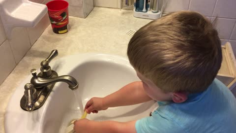 Boy Washes Cheetos In Bathroom Sink Before Eating Them