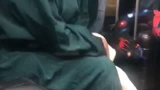 Woman falling asleep on bumpy subway train