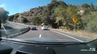 Car Overcorrects on Sweeping Highway Corner