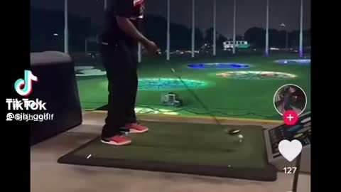 Dad One-Handed Swings Golf Ball Into Orbit At Top Golf