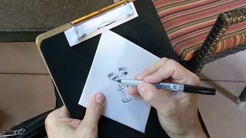 Live drawing on a cocktail napkin