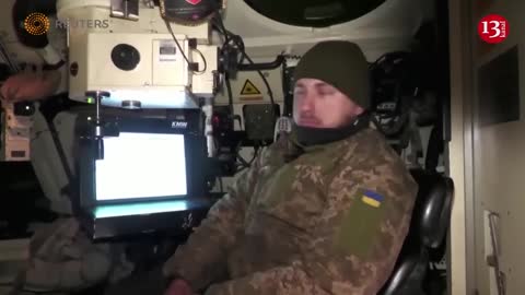 Ukrainian military near Soledar fire German-made howitzer