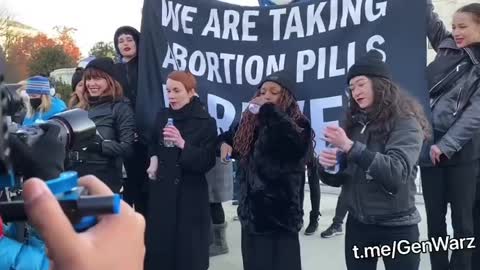 Pro-Abortion Activists Take Abortion Pills Outside Supreme Court